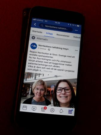 På bilden syns en mobil med facebookgruppen Norrbotten Taltidnings inlägg om spetspatienterna Åsa Holmgren och Pia Johansson.