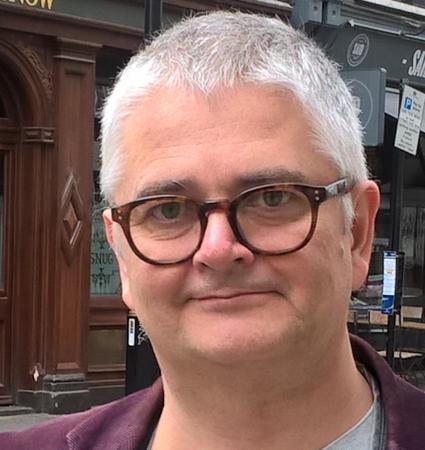 Anders Nystedt har glasögon och kort grått hår