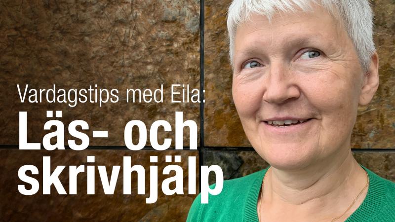 Eila har kortklippt, grått hår och bruna ögon. Hon har en grön topp och står vid en brun stenvägg.